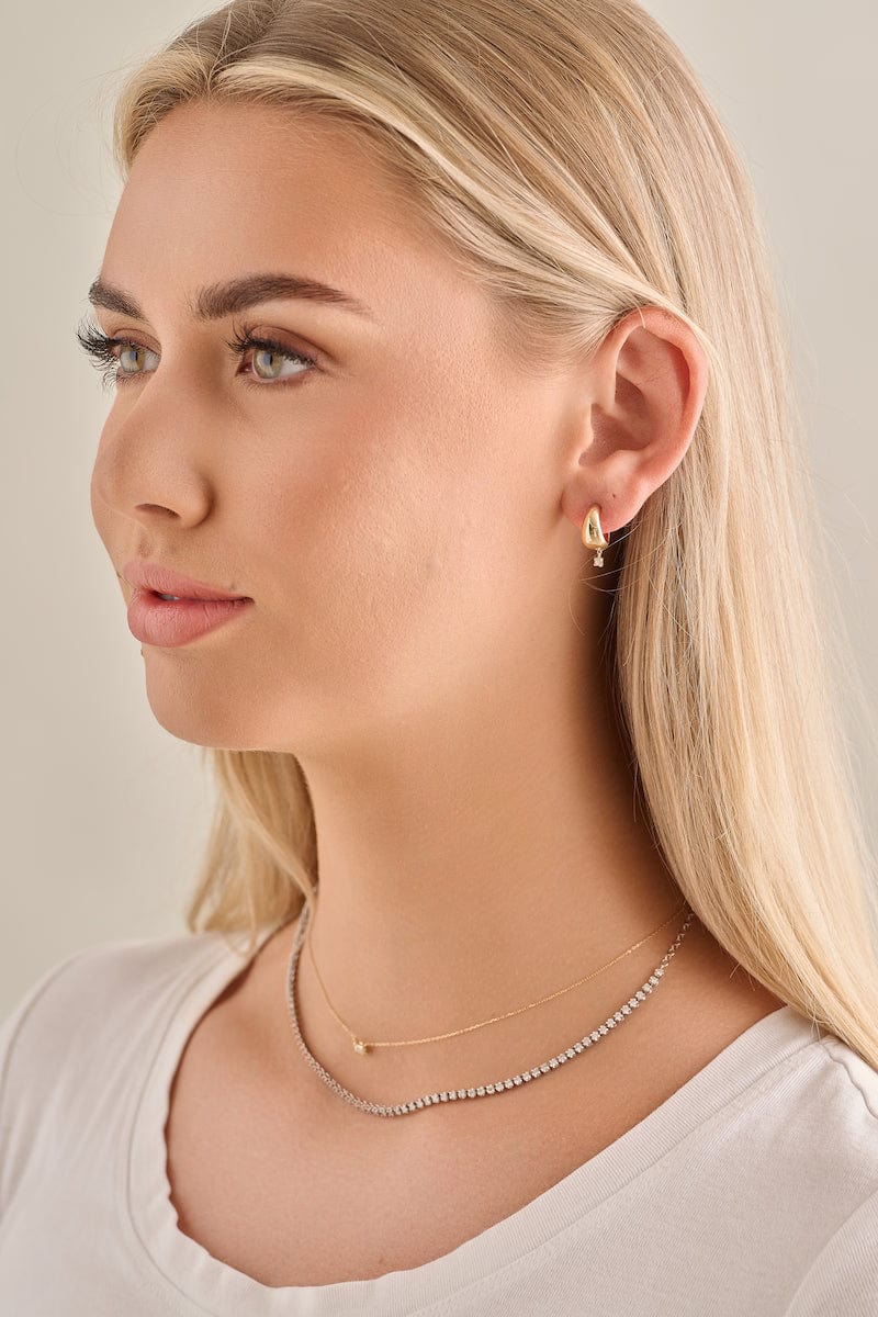 Henri Noël Earrings Thick Gold Hoop with Diamond Drop