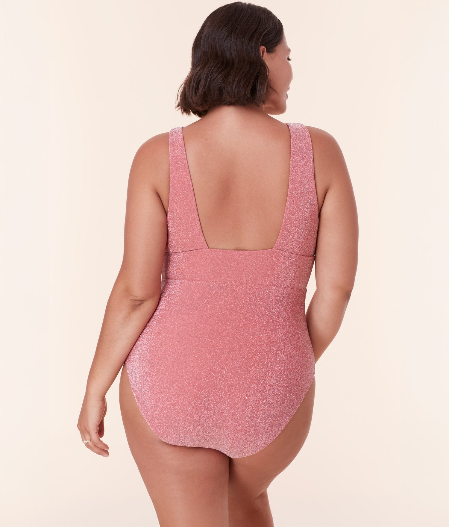 Back view of The Mykonos One Piece in Shell Glitter by Andie Swim, highlighting thick straps, a square backline, and full seat coverage.