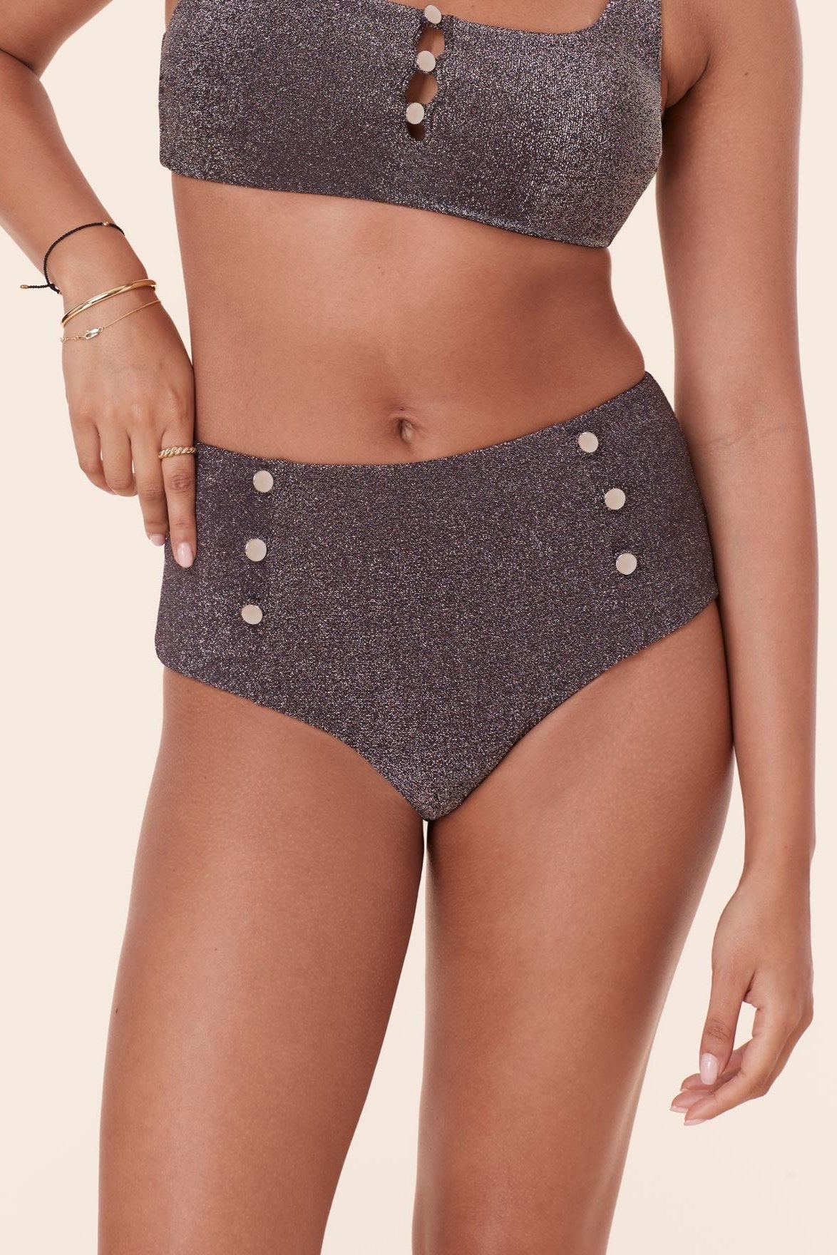 Front view of Andie Swim's Lipari Bikini Bottom in Licorice Glitter, highlighting the high-waist fit and decorative buttons, perfect for a chic, retro-inspired swim style.