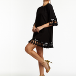 A-line, flowy with sleeves dress with tassel and sequin embellishments