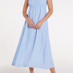 New in Margot Smocked Spaghetti Strap Midi Dress in Chambray Blue by Hermoza 