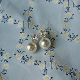 Nicola Bathie Jewelry earrings Golden Flower + Pearl Drop