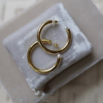 Nicola Bathie Jewelry Earrings Medium Chunky golden hoops + pearl