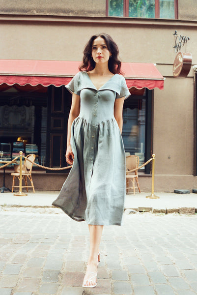 pale blue linen dress Helena / 100% in with Shell Buttons Its regular fit flatters