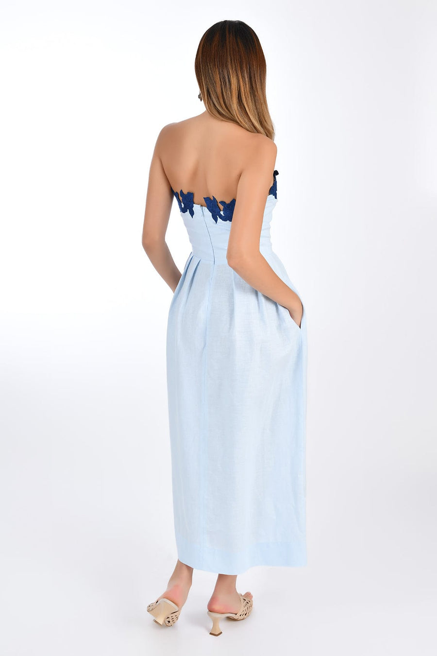 Fanm Mon Linen Lorr Midi Dress in Light Lagoon, showcasing hand-embroidered floral appliques on back. Back View.