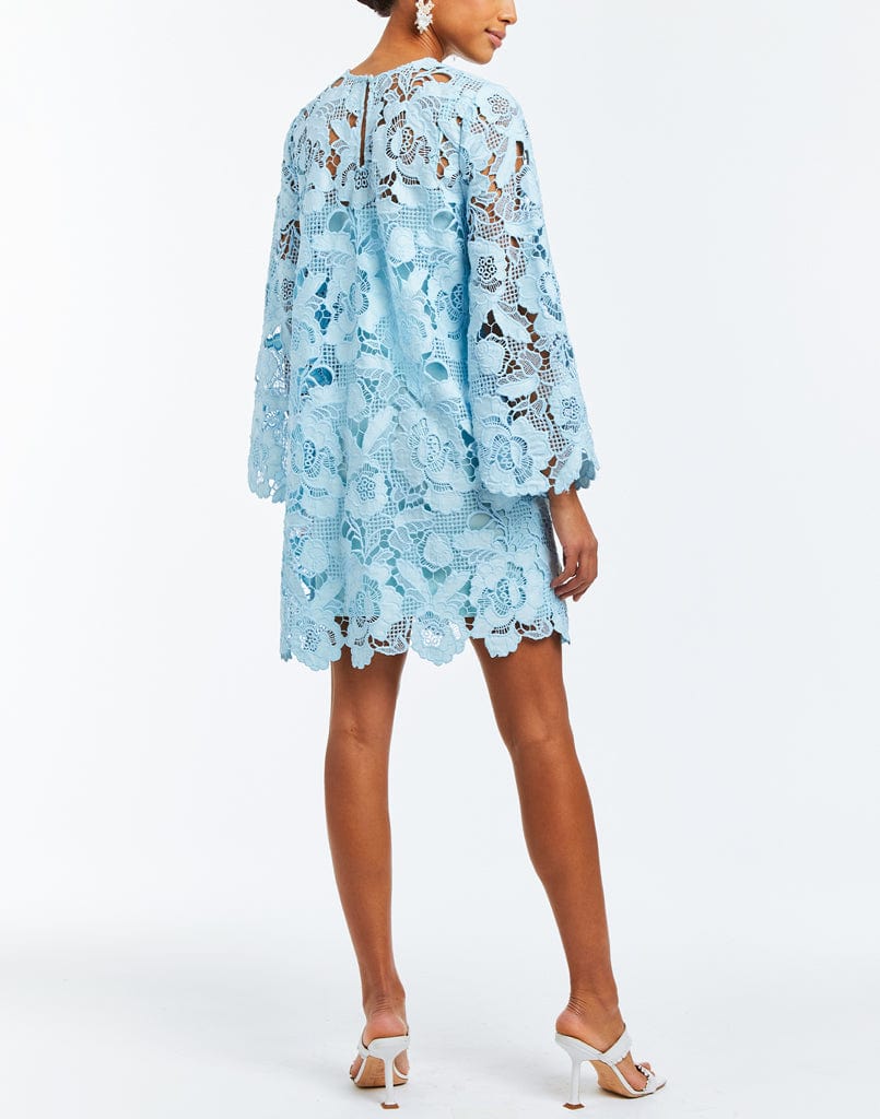 Laser-cut lace mini dress with scalloped hemline and full length bell sleeves.